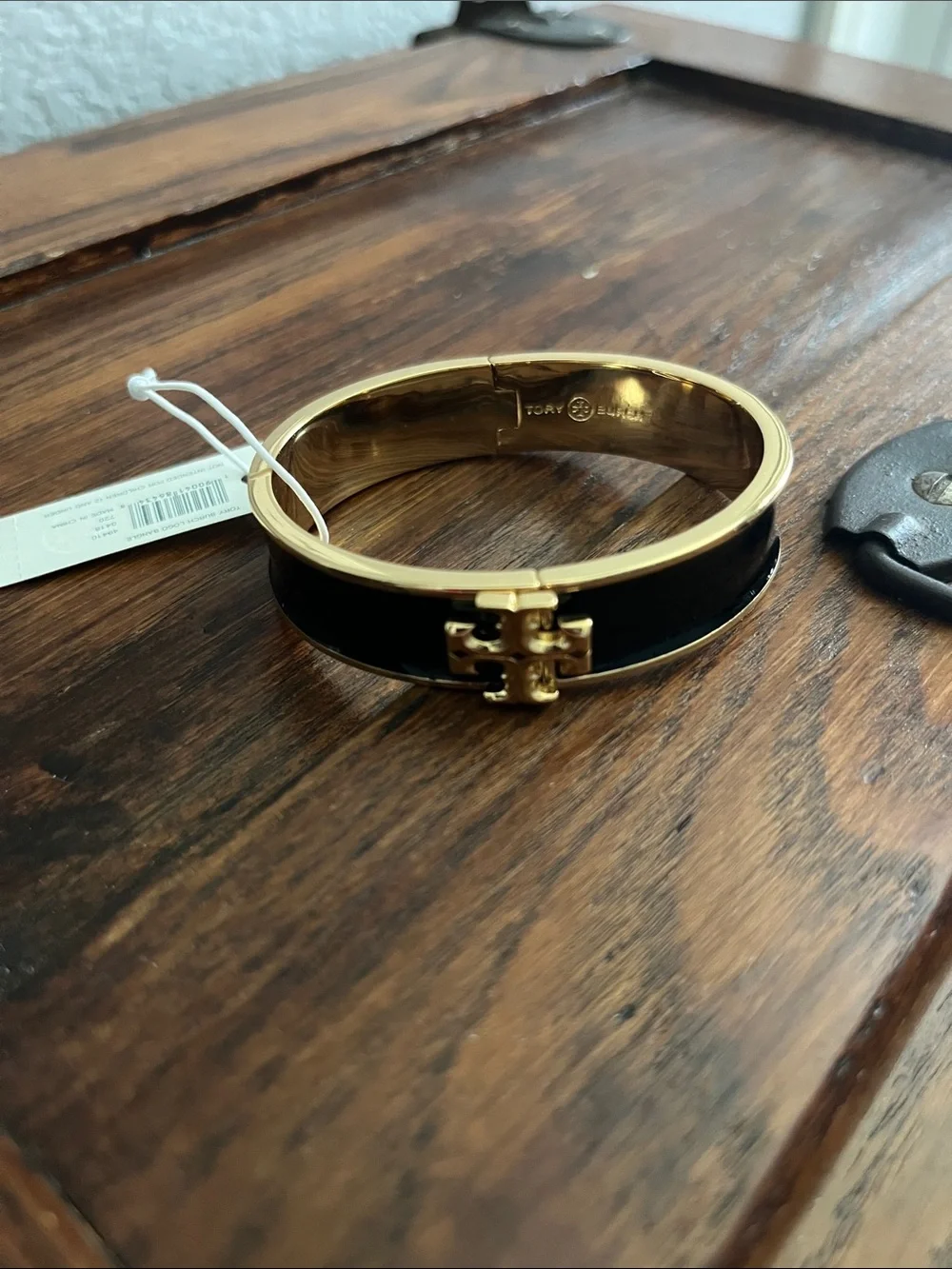 Tory Burch Black and Gold Logo Hinged Bangle